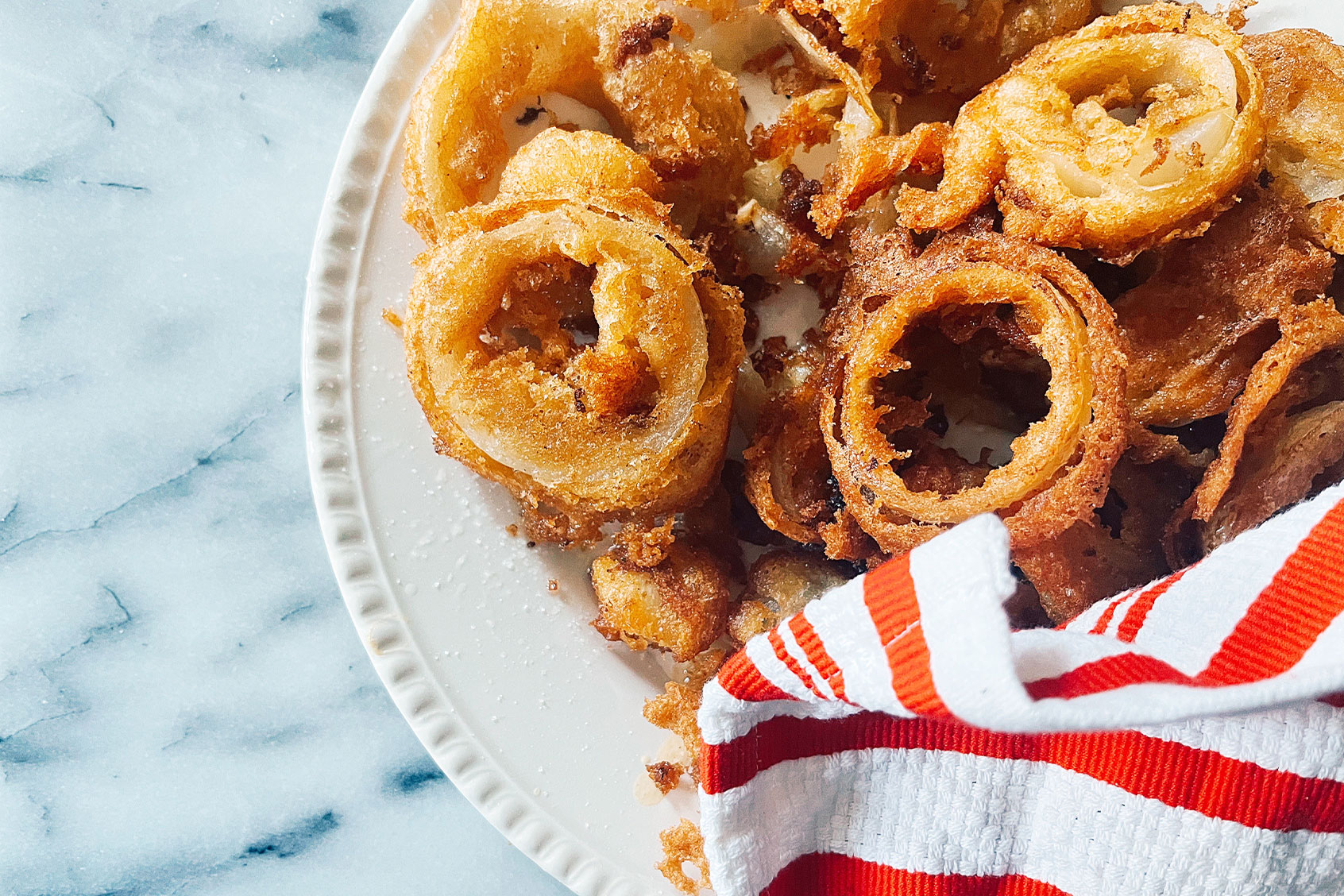 It’s almost too easy to make hot, fresh, fried onion rings